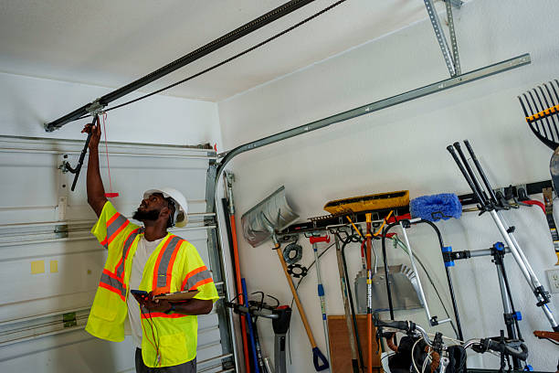Professional Garage Door Panel Replacement technician working in South Willard, UT